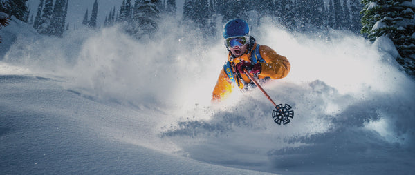 man skiing in a bern winter helmet