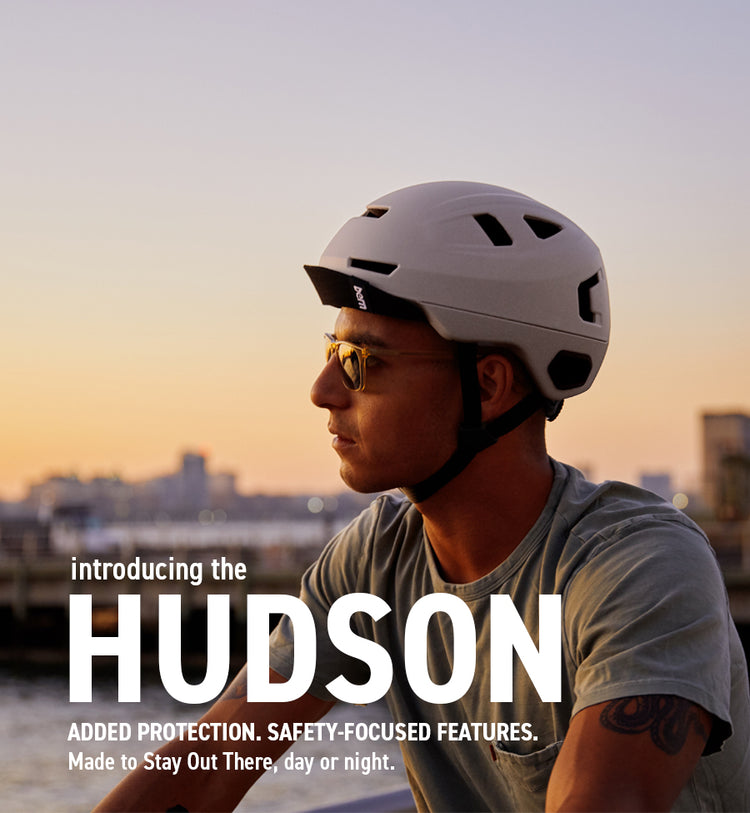 Man wearing hudson in New York City, urban cycling capital of the world.