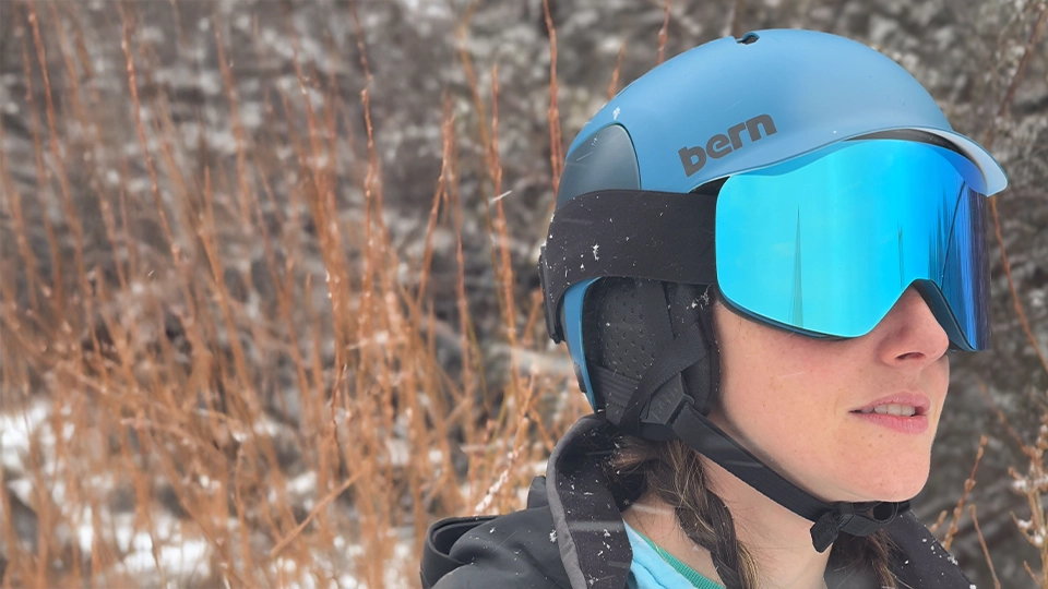 Woman wearing bern Watts 2.0 certified snow helmet