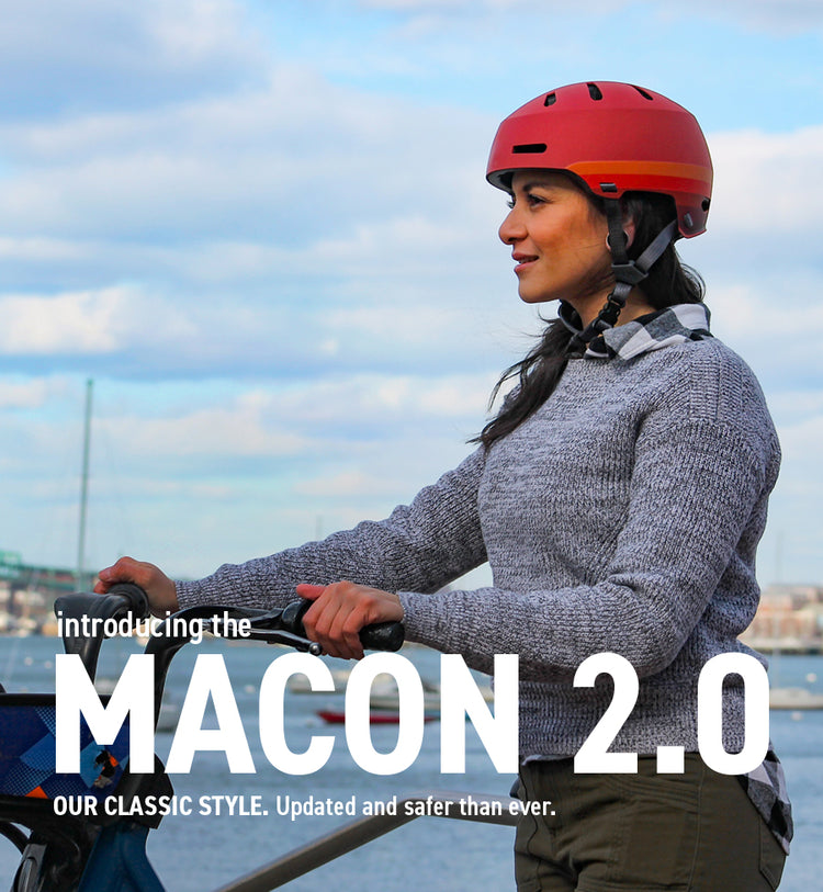 Woman wearing electric scooter helmet Macon 2.0 in Boston, Massachusetts.