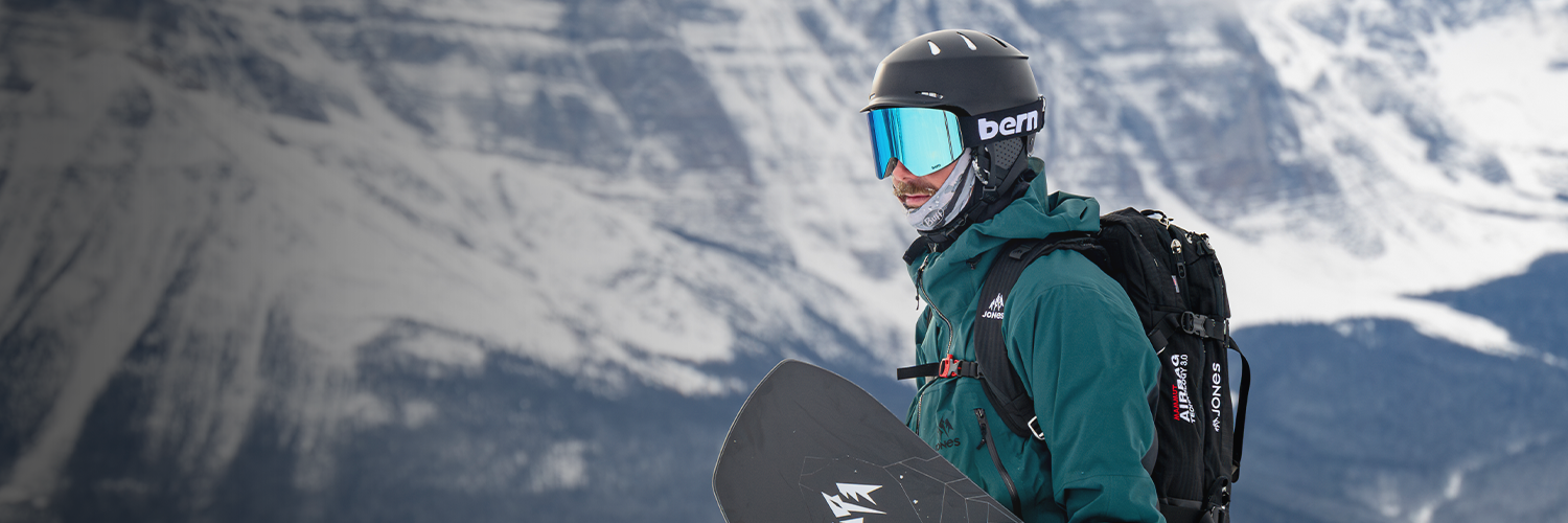 Snowboarder wearing bern hendrix winter helmet in harsh conditions in Canada.