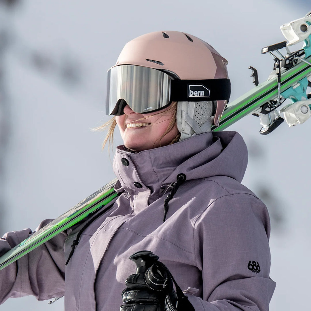 Woman skiing, wearing B-1 Zeiss Goggles, Sonar Silver Lens