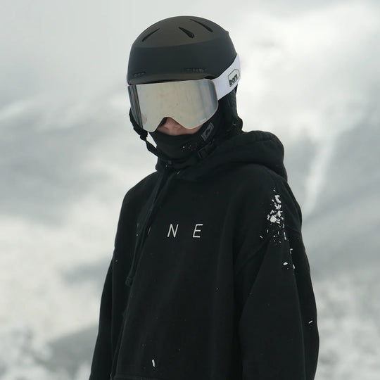 Kid wearing Hendrix Jr DVRT winter helmet on the mountain